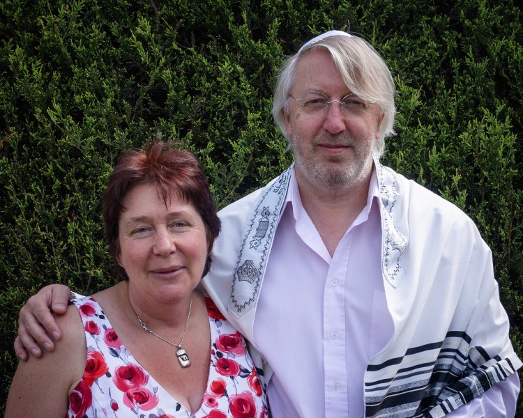 A picture of my mum and dad, with my Dad wearing the traditional jewish skull-cap and shawl.