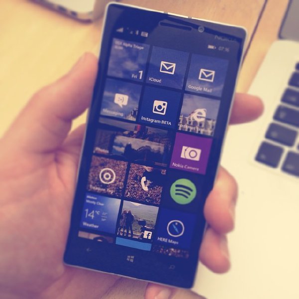 :A Nokia Windows phone device in my hand, showing the tile home screen.