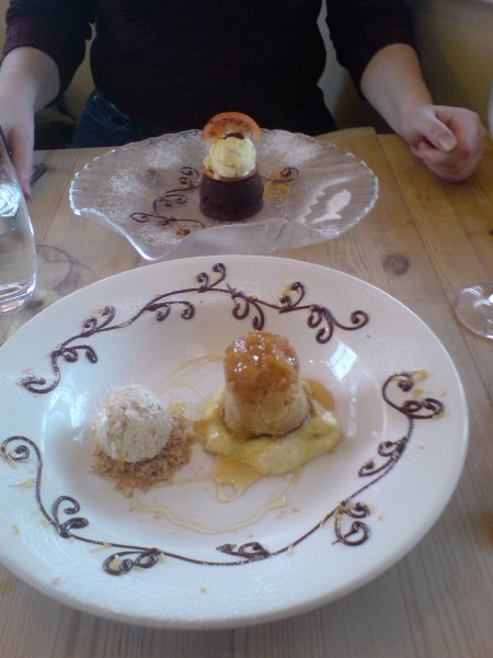 A picture of two fancy desserts that probably contain way too much sugar but were very nice.