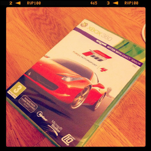 A photo of the case for the Xbox game Forza Motorsport 4 with a Ferrari on the cover.