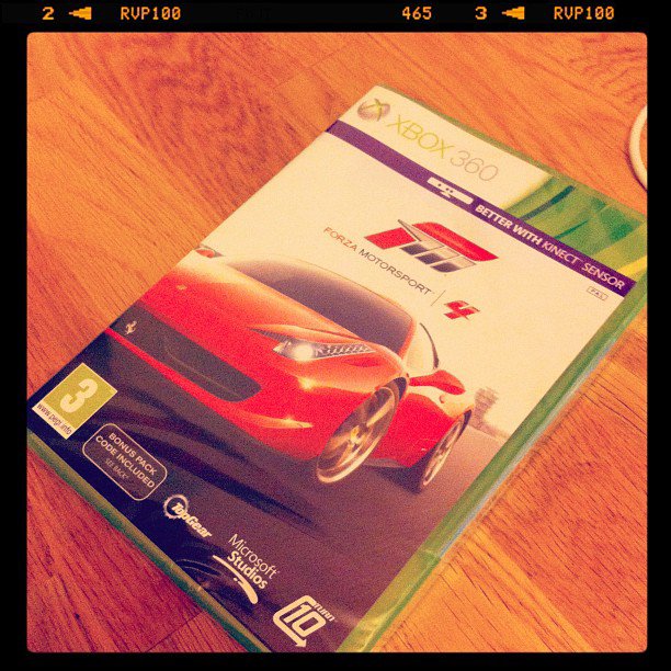 A photo of the case for the Xbox game Forza Motorsport 4 with a Ferrari on the cover.
