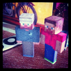 Two 3D-printed minecraft characters, about two inches tall and full colour. These are mine and Laura's player models.