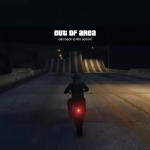 A screenshot of GTA V showing a characer sat on a motorbike at night with the warning on screen 'OUT OF AREA'