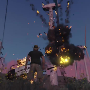 A screenshot of GTA V showing a helicopter exploding on a wind turbine