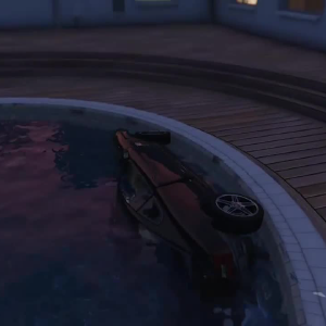 A screenshot of GTA V showing a car in a swimming pool.
