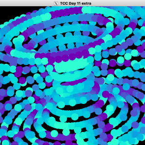 A video fo a window showing a spinning donut/torus that occasionally expands to reveal it's made up from lots of small spheres.