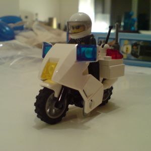 A small lego police motorbike