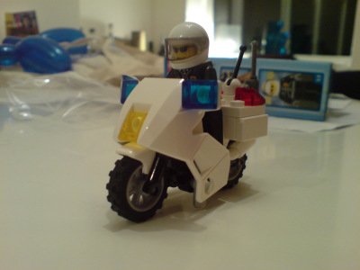 A small lego police motorbike